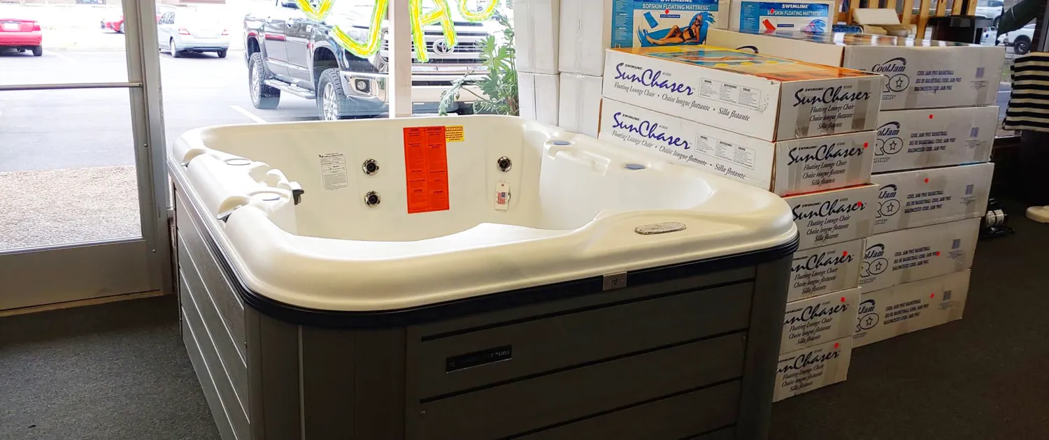 A Freeflow spa with the season's floats stacked and ready